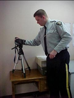 Cst. Darren Michels with Camera Equipment